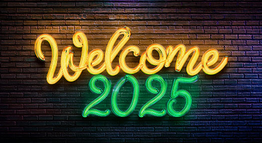 green and yellow neon letters say Welcome 2025