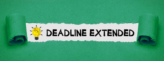 a piece of paper saying deadline extended!
