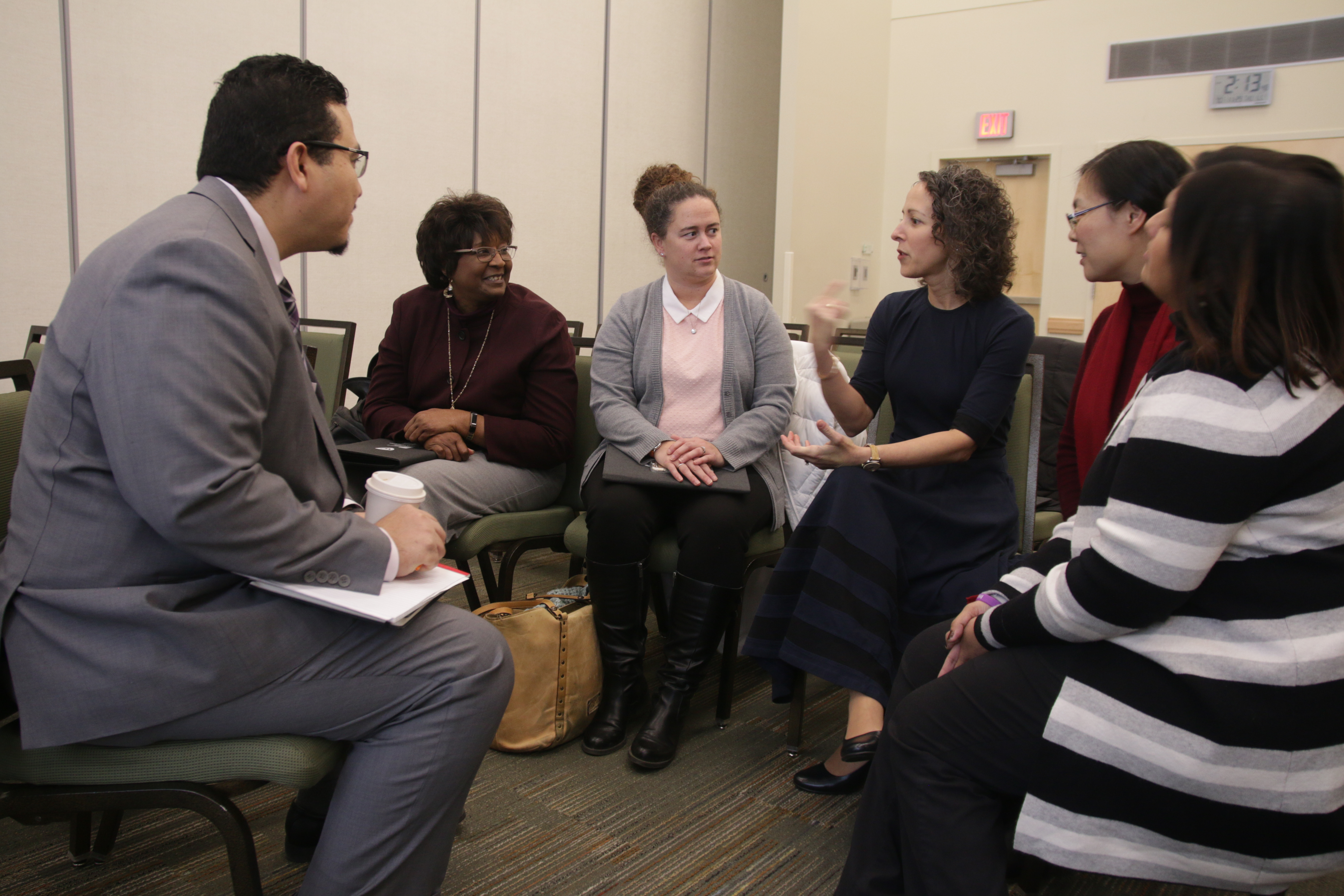 A small group working together during a breakout session.